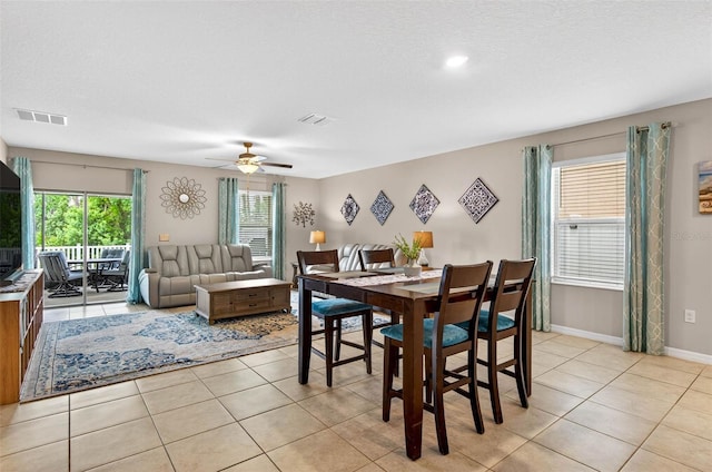 12835 Wildflower Meadow Dr, Riverview, FL 33579 - dining area with light tile patterned floors and ceiling fan