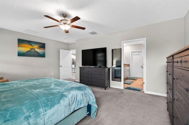 12835 Wildflower Meadow Dr, Riverview, FL 33579 - bedroom featuring light colored carpet, a ceiling fan, and ensuite bath