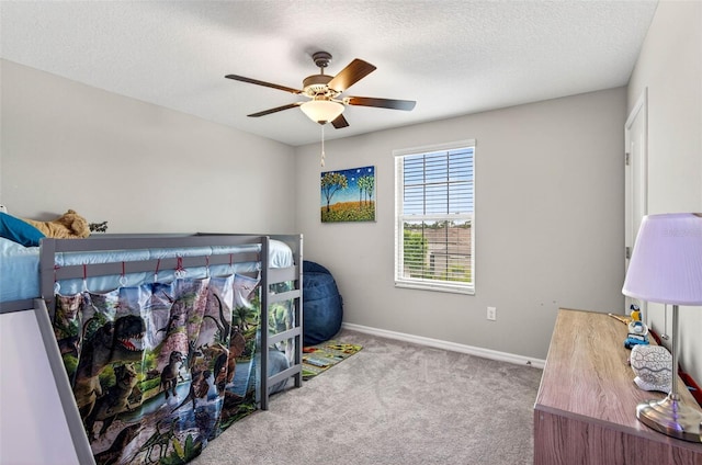 12835 Wildflower Meadow Dr, Riverview, FL 33579 - bedroom featuring carpet floors, a textured ceiling, and a ceiling fan