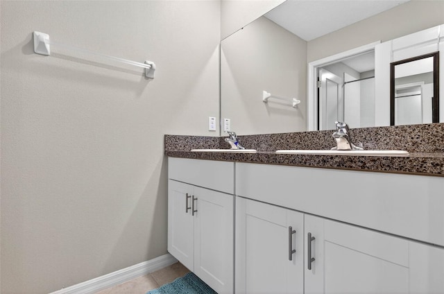 12835 Wildflower Meadow Dr, Riverview, FL 33579 - bathroom with double vanity and tile patterned flooring