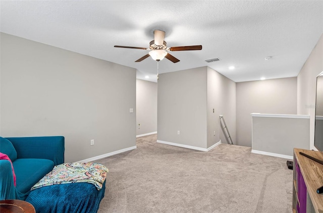 12835 Wildflower Meadow Dr, Riverview, FL 33579 - living area featuring an upstairs landing, carpet, a ceiling fan, and recessed lighting
