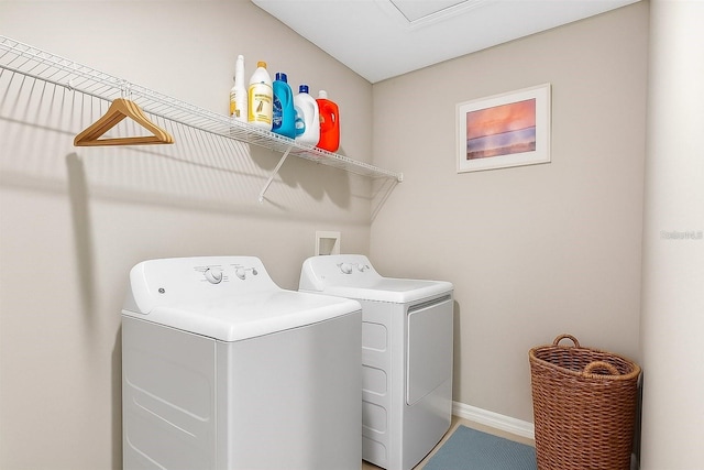 12835 Wildflower Meadow Dr, Riverview, FL 33579 - laundry area featuring washing machine and dryer and baseboards