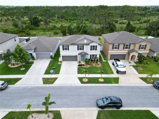 12835 Wildflower Meadow Dr, Riverview, FL 33579 - aerial perspective of suburban area featuring a heavily wooded area