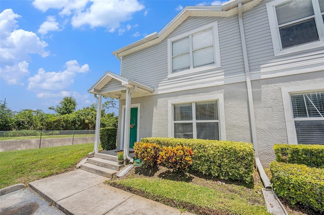 5501 67th Ave N Unit 11, Pinellas Park, FL 33781 - view of front of house with stucco siding