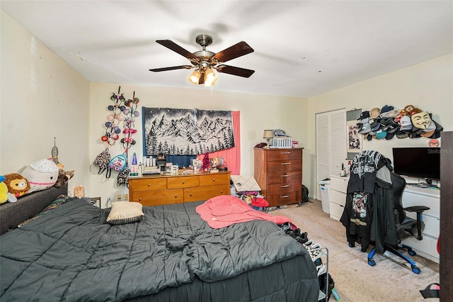 5501 67th Ave N Unit 11, Pinellas Park, FL 33781 - bedroom with light colored carpet, an office area, ceiling fan, and a closet