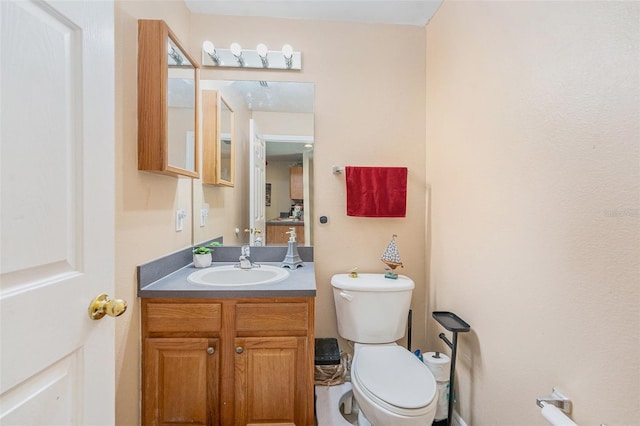 5501 67th Ave N Unit 11, Pinellas Park, FL 33781 - bathroom featuring toilet and vanity