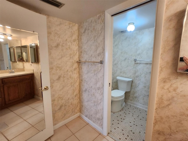 400 64th Ave Unit 1105, St Pete Beach, FL 33706 - bathroom with vanity and tile patterned floors