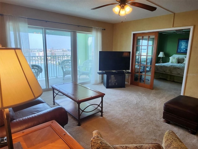 400 64th Ave Unit 1105, St Pete Beach, FL 33706 - living area featuring ceiling fan and carpet