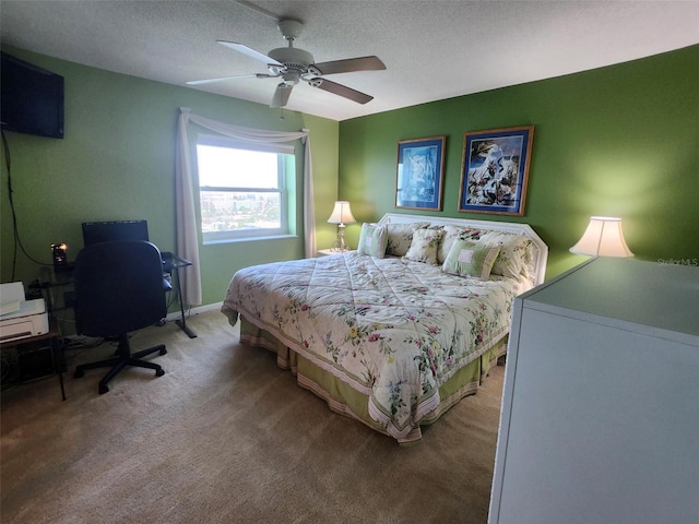 400 64th Ave Unit 1105, St Pete Beach, FL 33706 - bedroom featuring light colored carpet, ceiling fan, and a textured ceiling