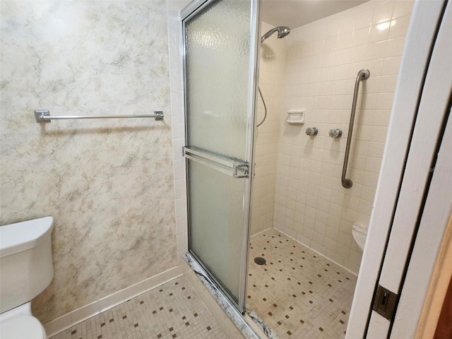 400 64th Ave Unit 1105, St Pete Beach, FL 33706 - bathroom with a shower stall and tile patterned floors