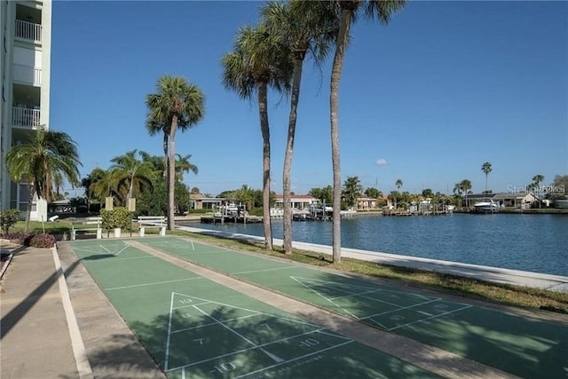 400 64th Ave Unit 1105, St Pete Beach, FL 33706 - view of home's community featuring a water view and shuffleboard