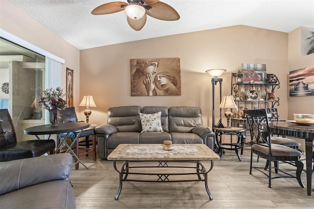 2922 60th St W, Bradenton, FL 34209 - living area featuring lofted ceiling, ceiling fan, and light wood finished floors