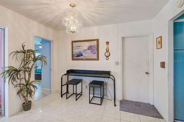 11082 90th Ter, Seminole, FL 33772 - dining space with a chandelier and light tile patterned flooring