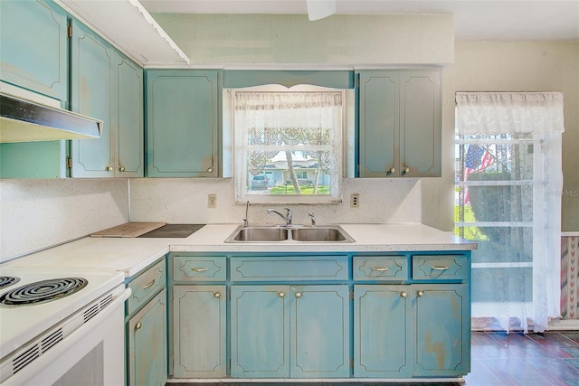 11082 90th Ter, Seminole, FL 33772 - kitchen with light countertops and electric range