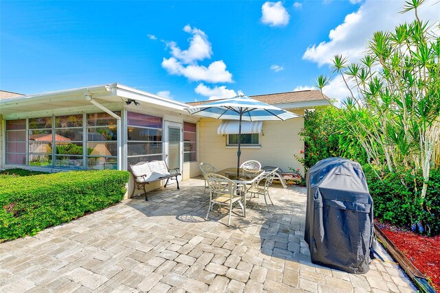 11082 90th Ter, Seminole, FL 33772 - view of patio / terrace featuring outdoor dining space and area for grilling