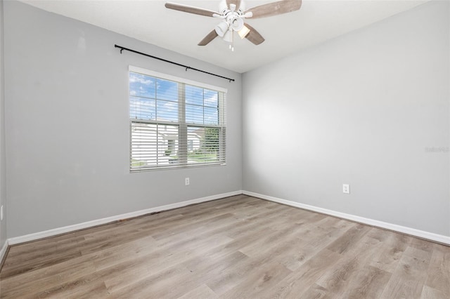 15406 Gopher Trop Pl, Sun City Center, FL 33573 - spare room with light wood-style flooring and a ceiling fan