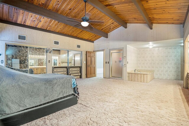 9938 Alavista Dr, Gibsonton, FL 33534 - carpeted bedroom with wood walls and wallpapered walls