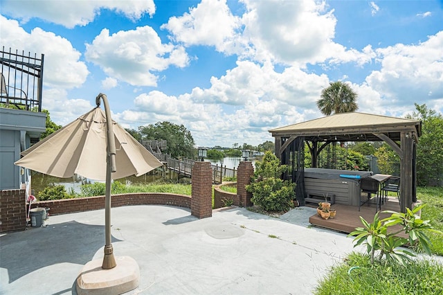 9938 Alavista Dr, Gibsonton, FL 33534 - view of patio / terrace with a hot tub, a gazebo, and a wooden deck