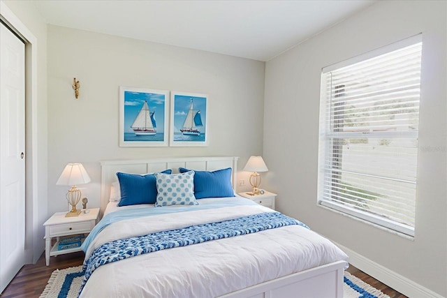 706 E Gate Dr, Safety Harbor, FL 34695 - bedroom featuring wood finished floors