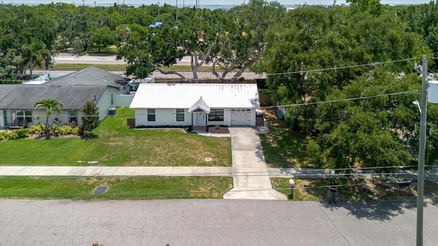 706 E Gate Dr, Safety Harbor, FL 34695 - aerial view of property and surrounding area with a tree filled landscape
