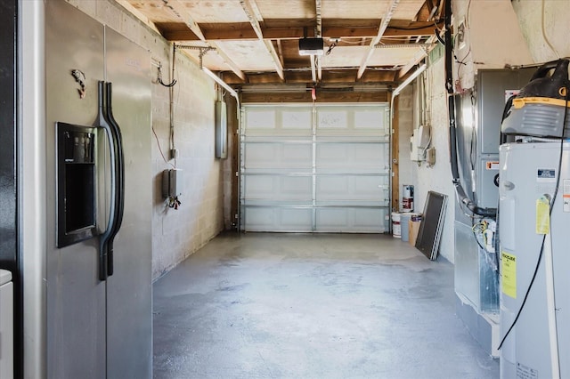 706 E Gate Dr, Safety Harbor, FL 34695 - garage with stainless steel refrigerator with ice dispenser, electric water heater, and a garage door opener