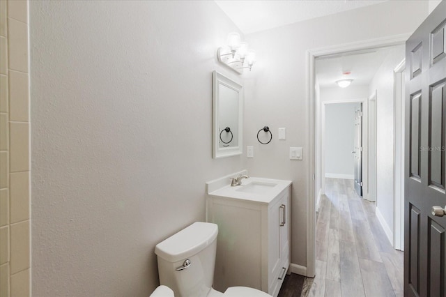 706 E Gate Dr, Safety Harbor, FL 34695 - bathroom featuring vanity and wood finished floors