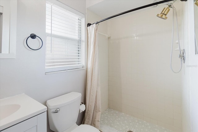 706 E Gate Dr, Safety Harbor, FL 34695 - bathroom featuring vanity and a tile shower