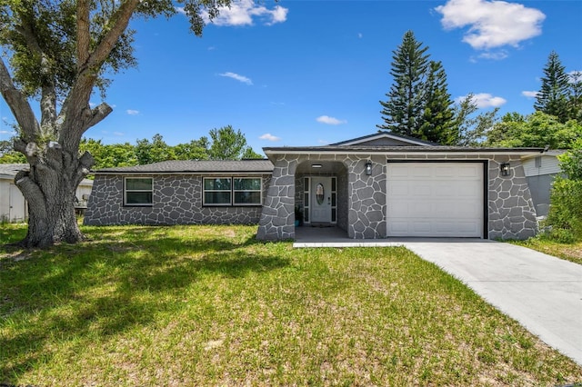 6200 13th Ave, New Port Richey, FL 34653 - ranch-style home featuring an attached garage, driveway, a front yard, and stone siding