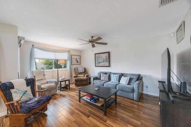 9205 Jakes Path, Largo, FL 33771 - living area featuring a ceiling fan and wood finished floors