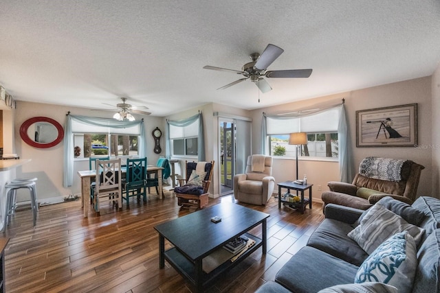 9205 Jakes Path, Largo, FL 33771 - living room with ceiling fan, a textured ceiling, and wood finished floors