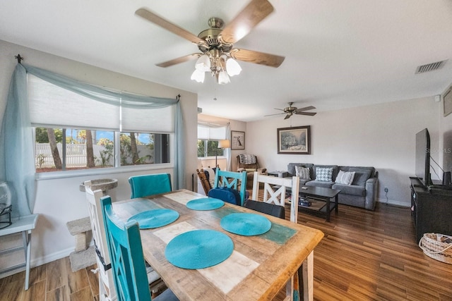 9205 Jakes Path, Largo, FL 33771 - dining room with ceiling fan and wood finished floors