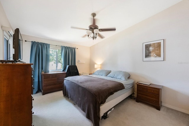 9205 Jakes Path, Largo, FL 33771 - bedroom with light colored carpet and a ceiling fan