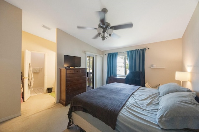 9205 Jakes Path, Largo, FL 33771 - bedroom featuring vaulted ceiling, carpet flooring, ceiling fan, access to outside, and connected bathroom