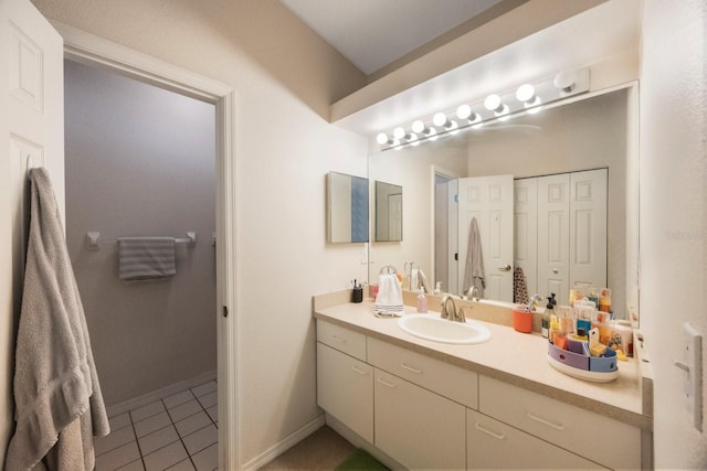 9205 Jakes Path, Largo, FL 33771 - bathroom featuring vanity, tile patterned floors, and a closet