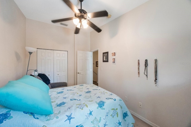 9205 Jakes Path, Largo, FL 33771 - bedroom with carpet floors, a closet, and a ceiling fan