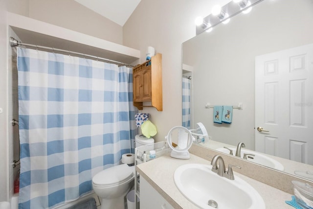 9205 Jakes Path, Largo, FL 33771 - full bathroom featuring vanity, lofted ceiling, and a shower with shower curtain
