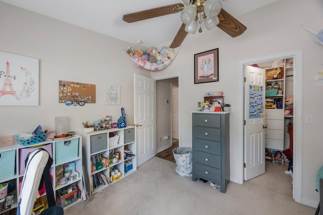 9205 Jakes Path, Largo, FL 33771 - bedroom featuring light carpet, a spacious closet, a ceiling fan, lofted ceiling, and a closet