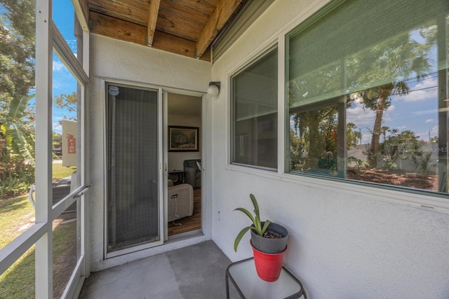 9205 Jakes Path, Largo, FL 33771 - unfurnished sunroom featuring healthy amount of natural light