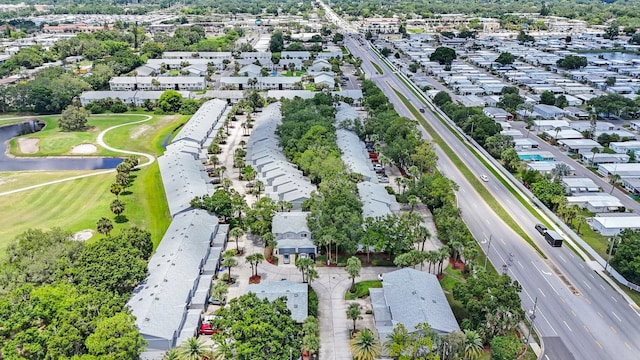 9205 Jakes Path, Largo, FL 33771 - aerial view of residential area with a large body of water and a golf course