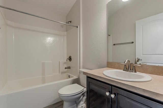 10915 Kirkwall Port Dr, Wimauma, FL 33598 - bathroom with vanity, shower / bath combination, and a textured wall