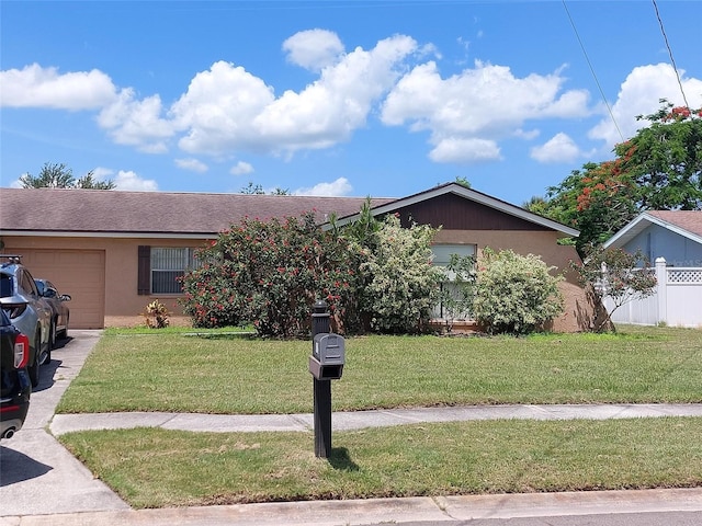 432 Flamingo Dr, Apollo Beach, FL 33572 - view of front of home featuring a garage and stucco siding