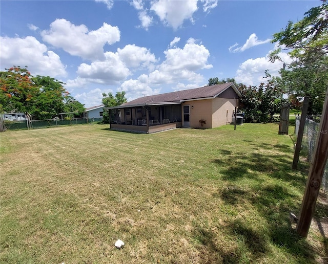 432 Flamingo Dr, Apollo Beach, FL 33572 - view of yard featuring a sunroom