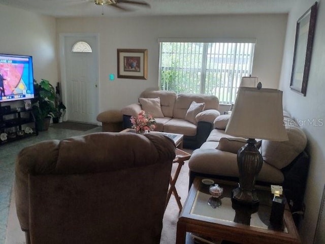 432 Flamingo Dr, Apollo Beach, FL 33572 - carpeted living area featuring a ceiling fan