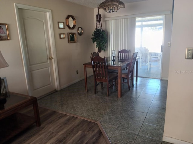 432 Flamingo Dr, Apollo Beach, FL 33572 - dining room with dark tile patterned floors