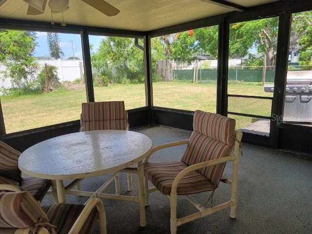 432 Flamingo Dr, Apollo Beach, FL 33572 - sunroom / solarium featuring a ceiling fan and outdoor dining space