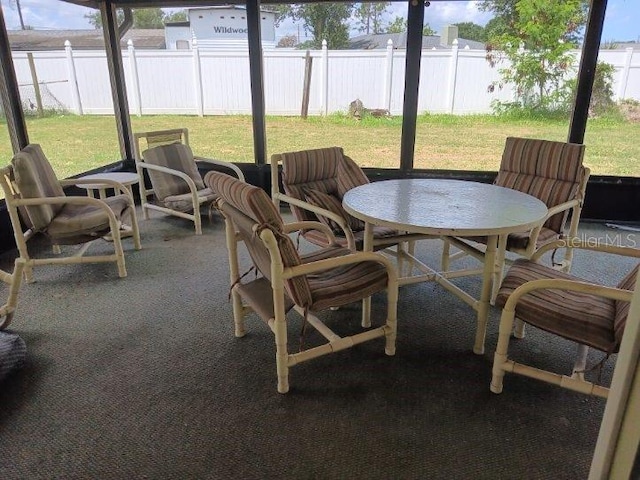 432 Flamingo Dr, Apollo Beach, FL 33572 - sunroom featuring outdoor dining area