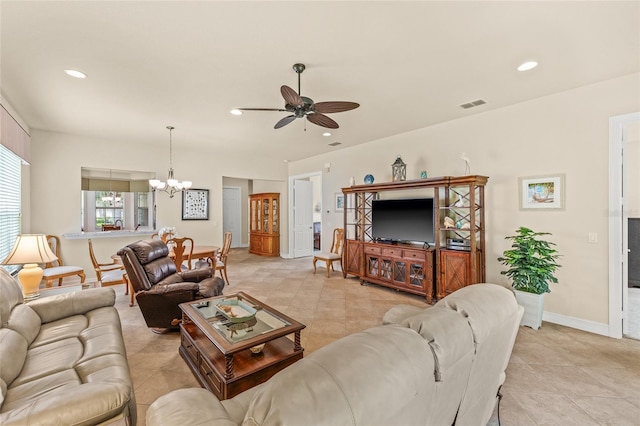 4911 Rock Island Ct, Wimauma, FL 33598 - living room featuring a chandelier, a ceiling fan, recessed lighting, and light tile patterned floors