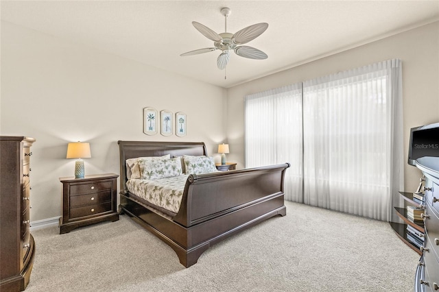 4911 Rock Island Ct, Wimauma, FL 33598 - carpeted bedroom with baseboards and ceiling fan
