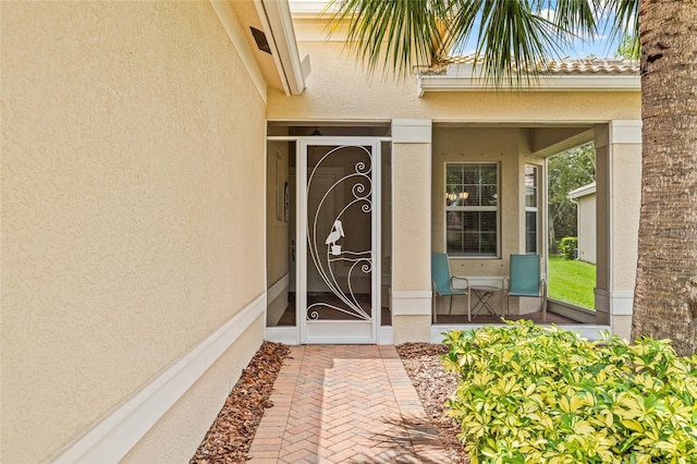 4911 Rock Island Ct, Wimauma, FL 33598 - view of exterior entry with stucco siding