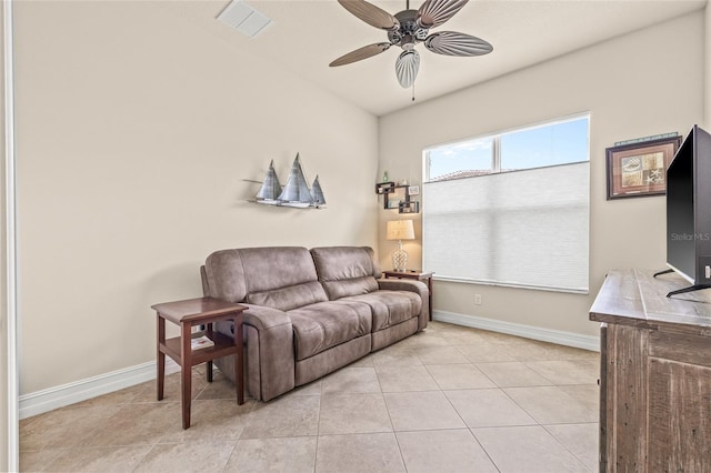 4911 Rock Island Ct, Wimauma, FL 33598 - living room with a ceiling fan and light tile patterned floors
